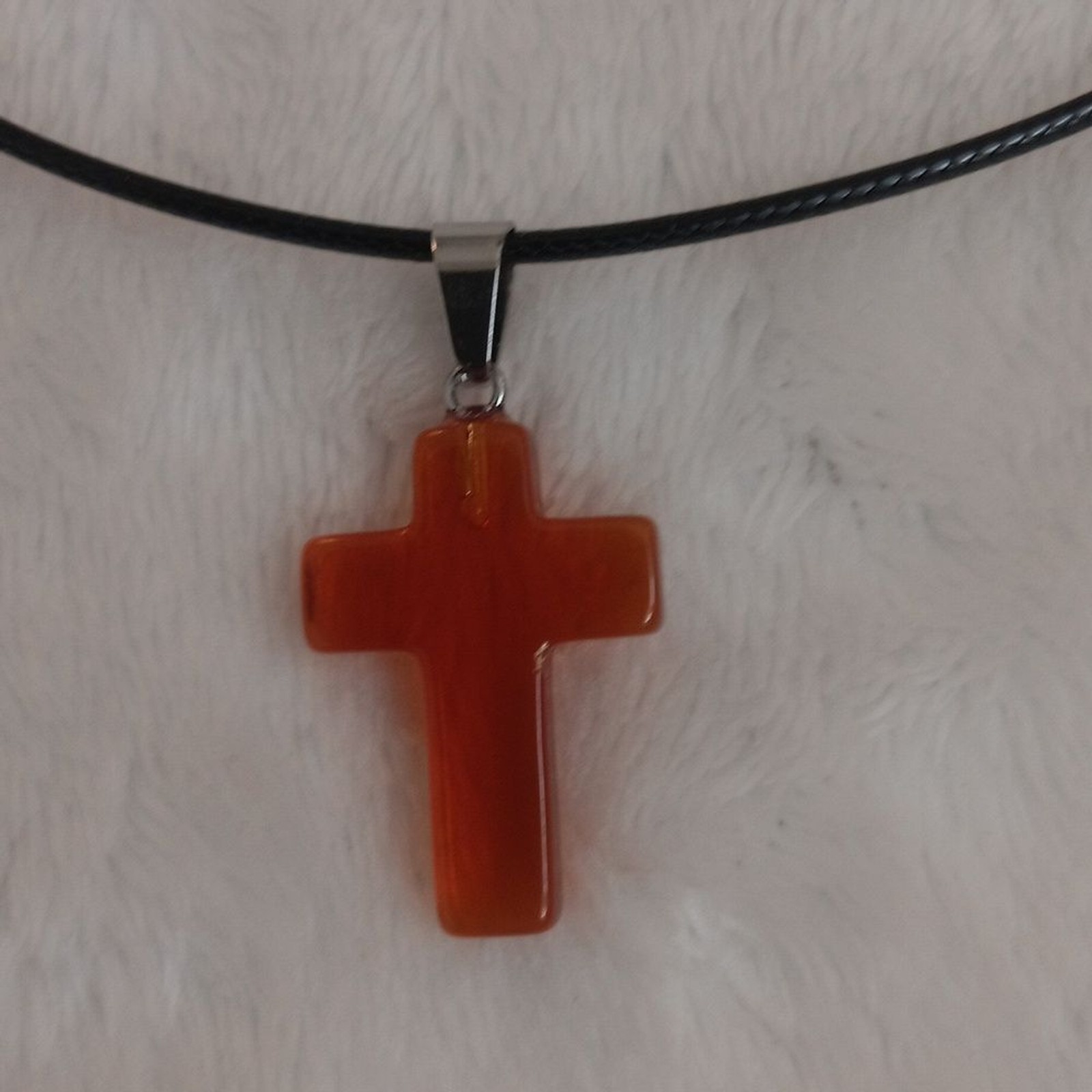 Elegant Black Necklace with Orange Cross Pendant