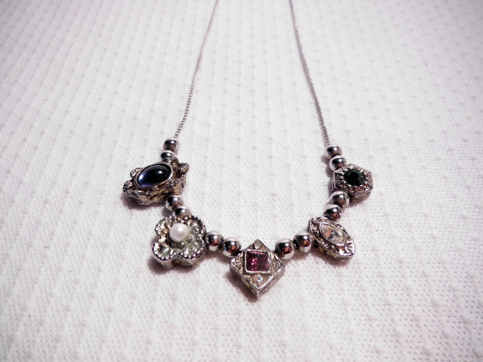 SILVER COLOR NECKLACE ~ VARIOUS COLORED STONES IN DIFFERENT SHAPES.