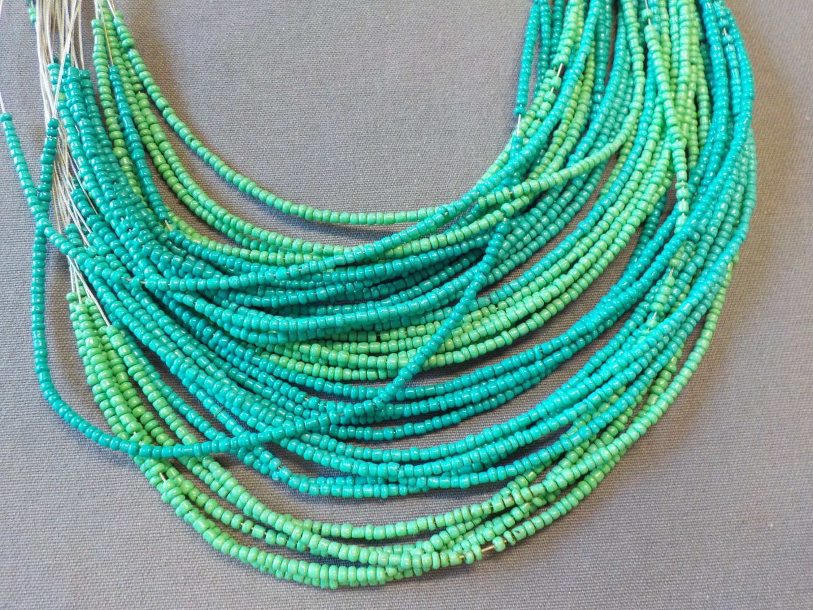 Turquoise Color Seed Beads Necklace Silver Tone Metal Multi Strand Wire Glass