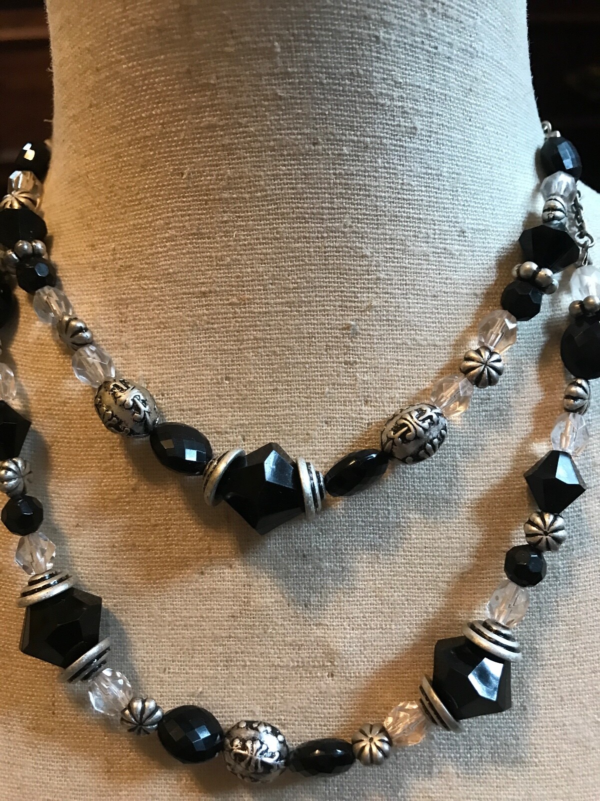DOUBLE STRAND OF BLACK AND CLEAR PLASTIC AND METAL BEADED NECKLACE 15″