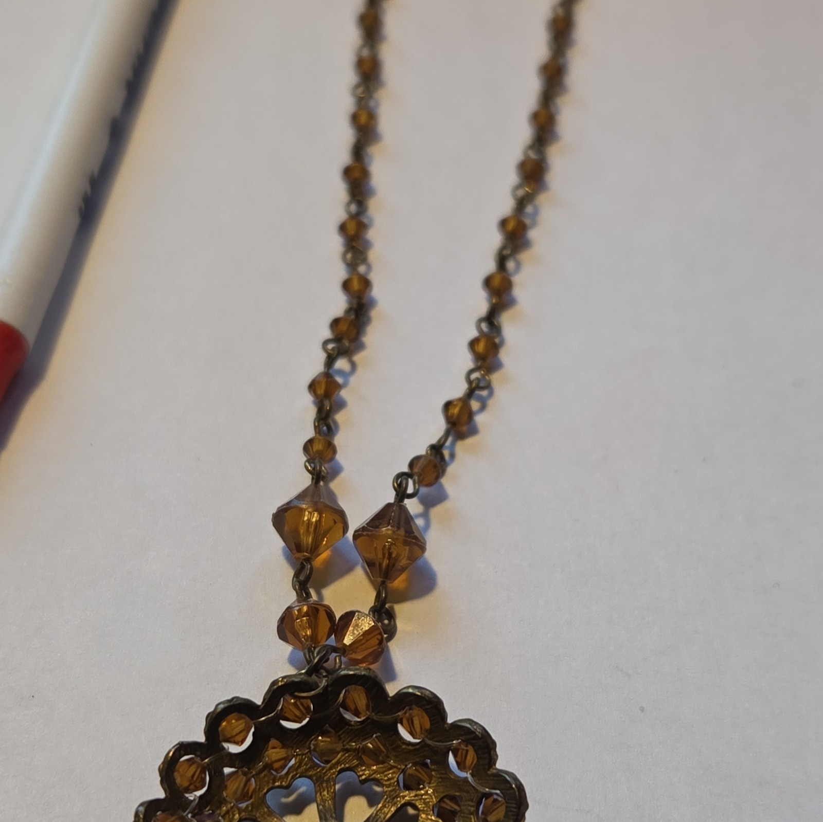 ICING Gold Tone Brown Beaded Necklace, Round Yellow Crystal Pendant, Lobster