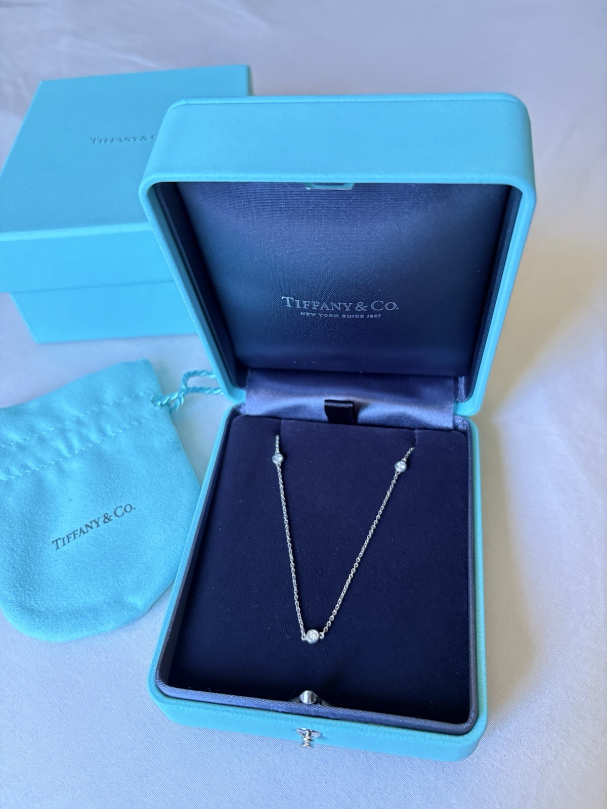 Authentic Tiffany & Co. Three round natural diamonds Necklace. NEW