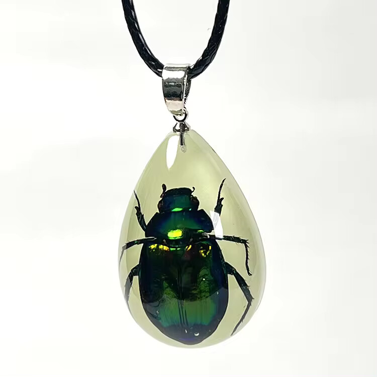 Glow in the dark bug necklaces in resin