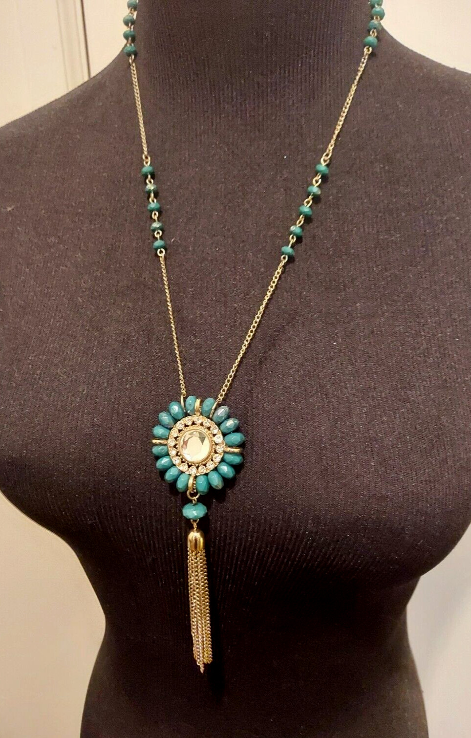 Cara New York green circular pendant with chain tassel 29″ long necklace