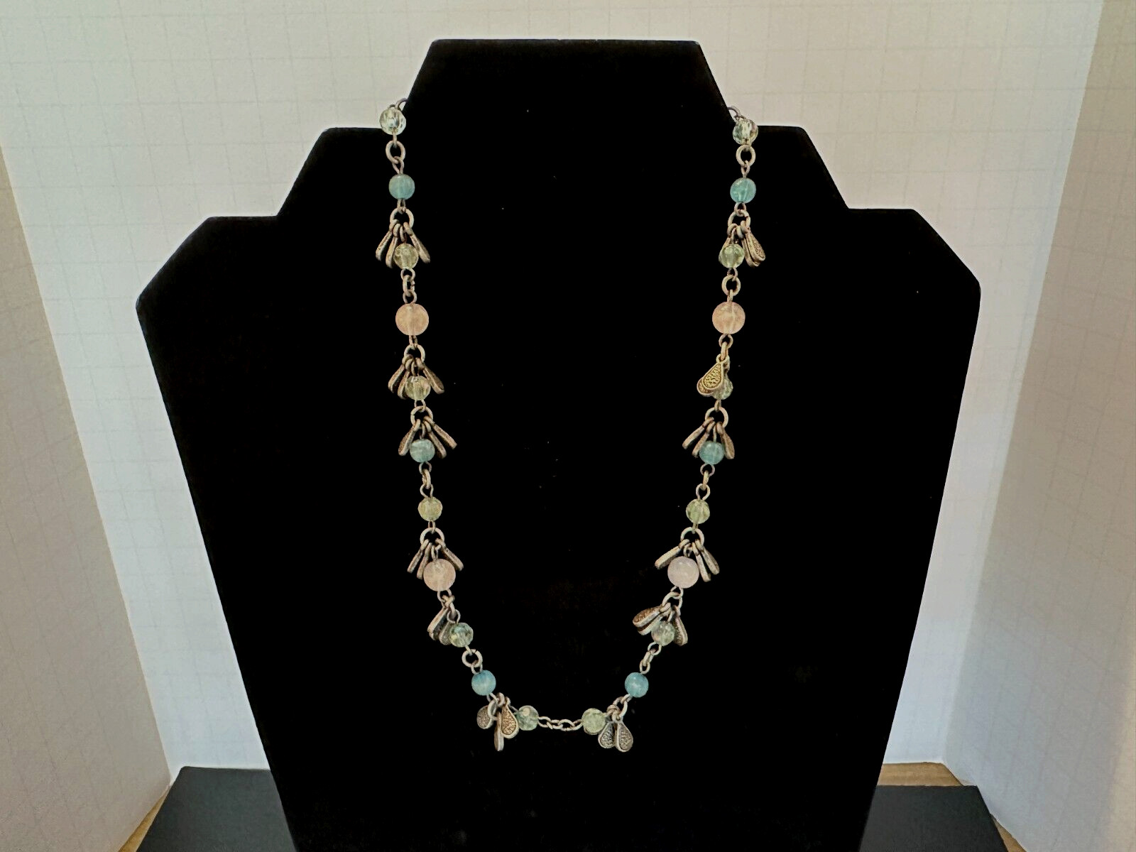 Fashion jewelry necklace 16″ bead and metal accents as shown.