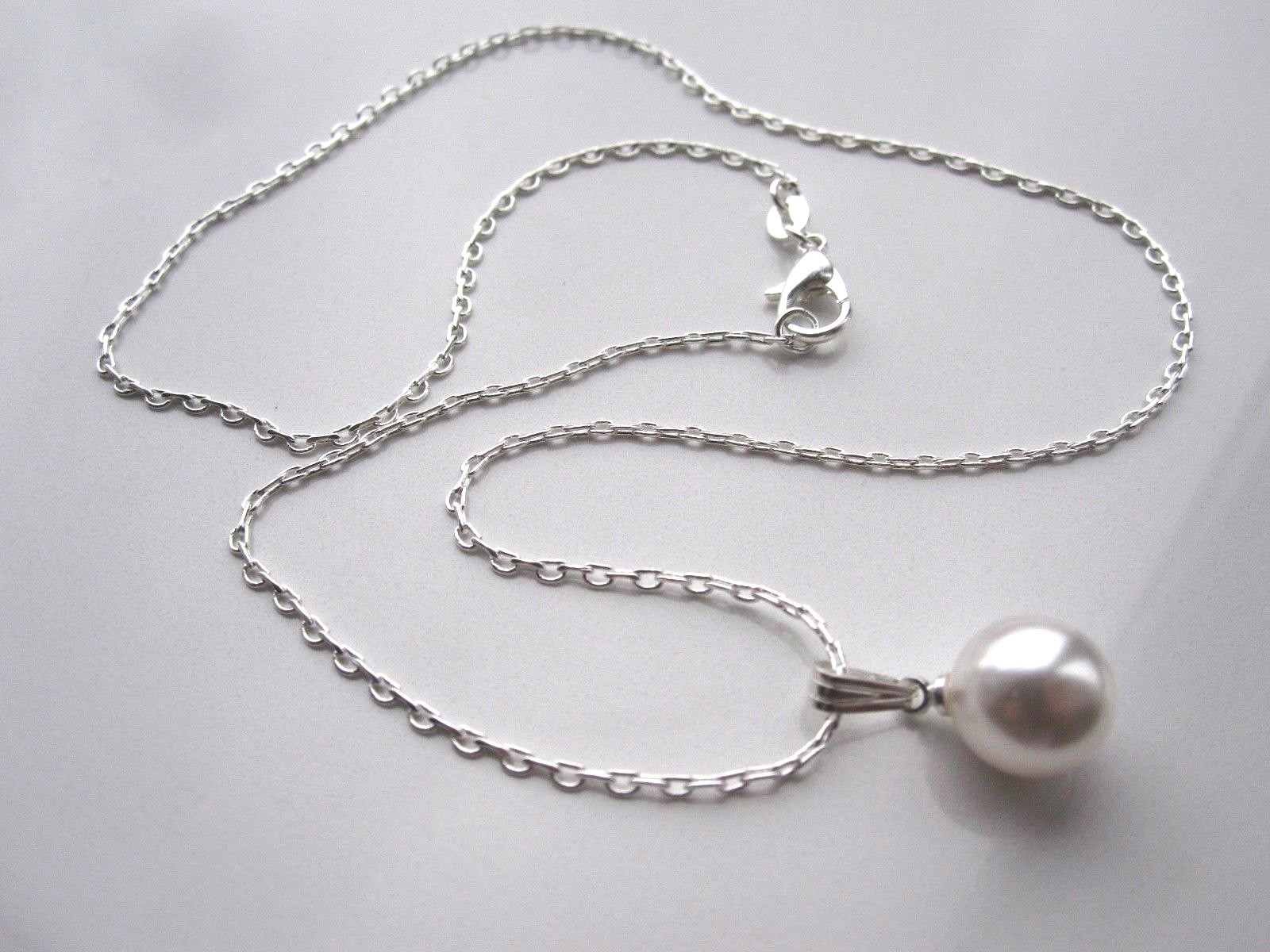 sa9. Silver Plated Necklace Made With a Swarovski White Pearl Pendant