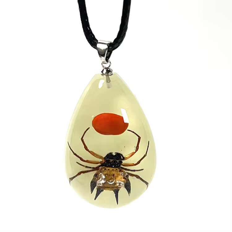 Glow in the dark bug necklaces in resin