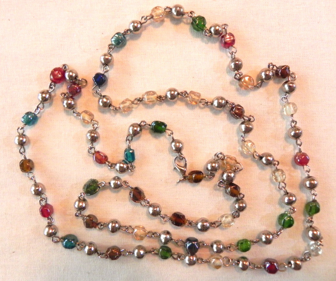 Long Rosary Chain beaded necklace Jewel Tones Silver Color beads Unknown vintage
