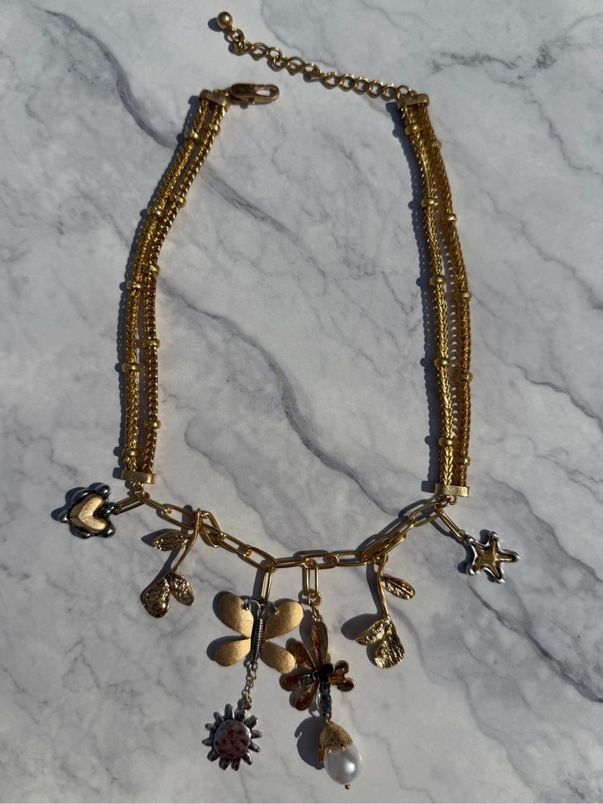 Gold-Tone Floral Charm Necklace with Mixed Metal Accents