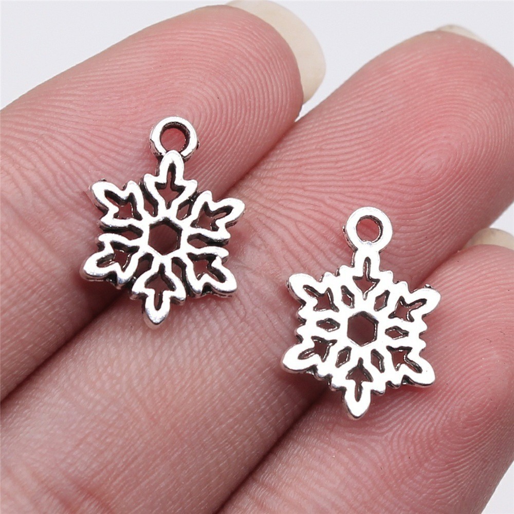 60PCS Silver Tone Metal Filigree Snowflake Charm Pendant XCS127