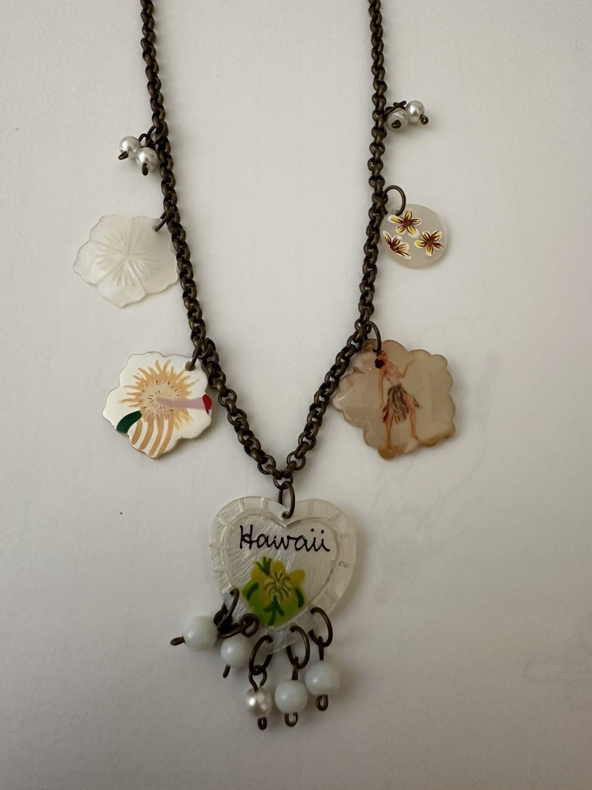Les Nereides Paris Necklace with Hawaii Charms. Unworn and in great condition