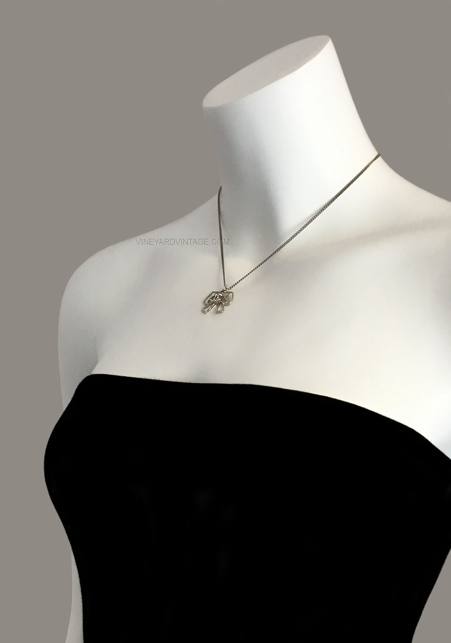 CHANEL AUTHENTIC OPEN WORK BOW & CRYSTAL CC LOGO NECKLACE