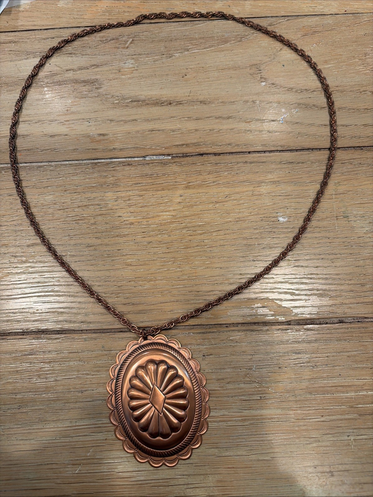 bronze colored necklace with pendant 28 In Chain
