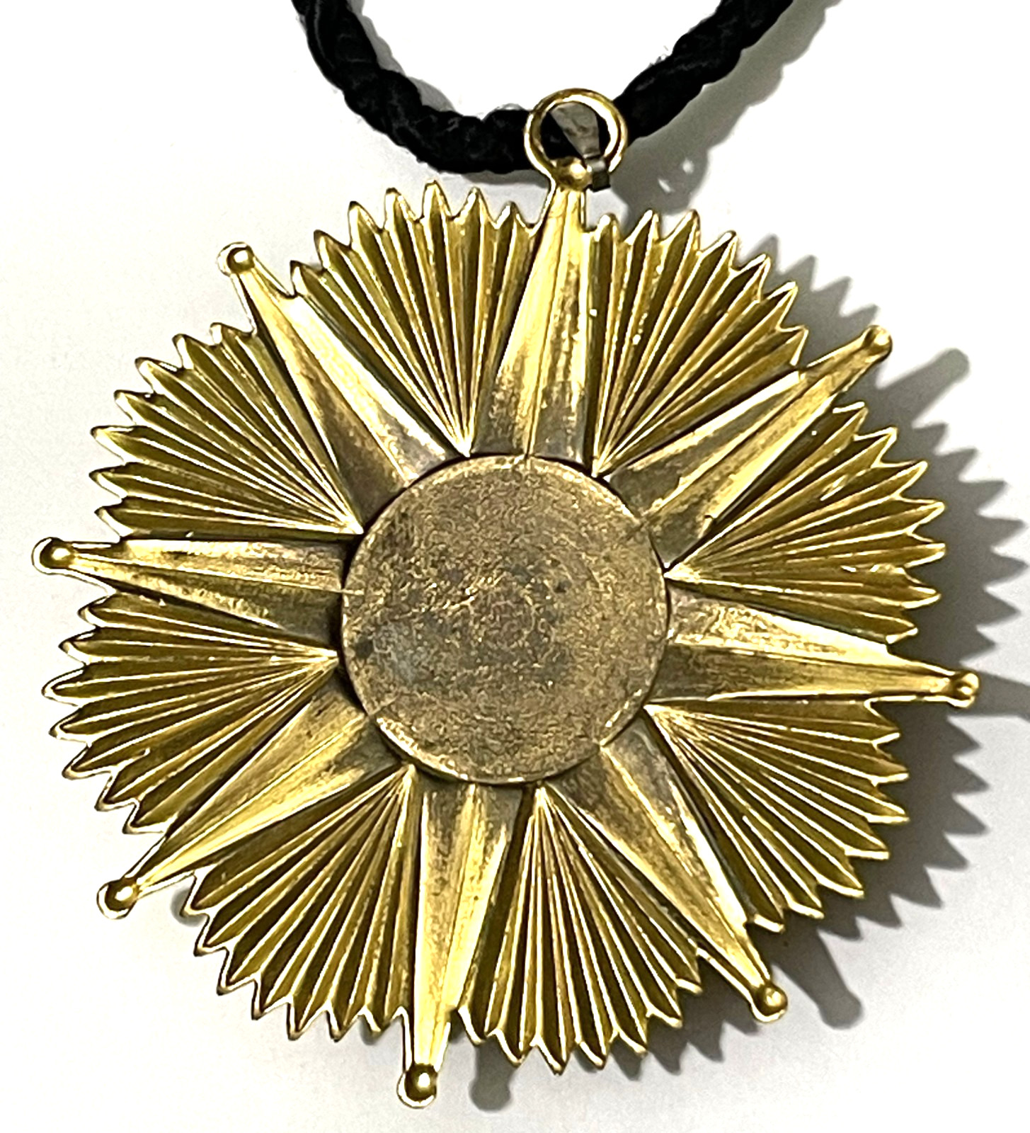 Vtg Gold Tone Sunburst Pendant Necklace w/ Green Acrylic / Resin Warrior Mask.