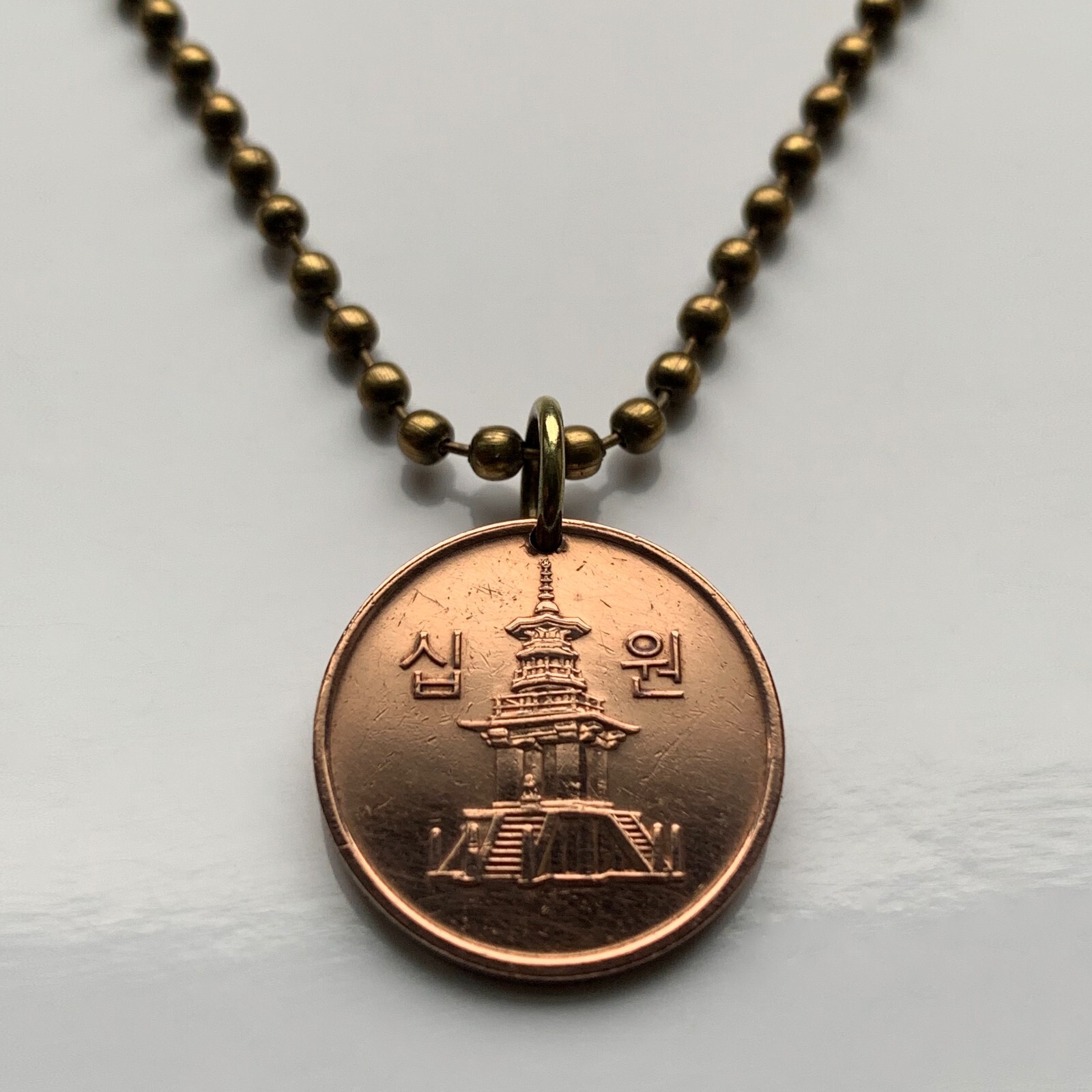 2007 South Korea coin pendant stone Dabotap Pagoda temple Bulguksa Seoul n000549