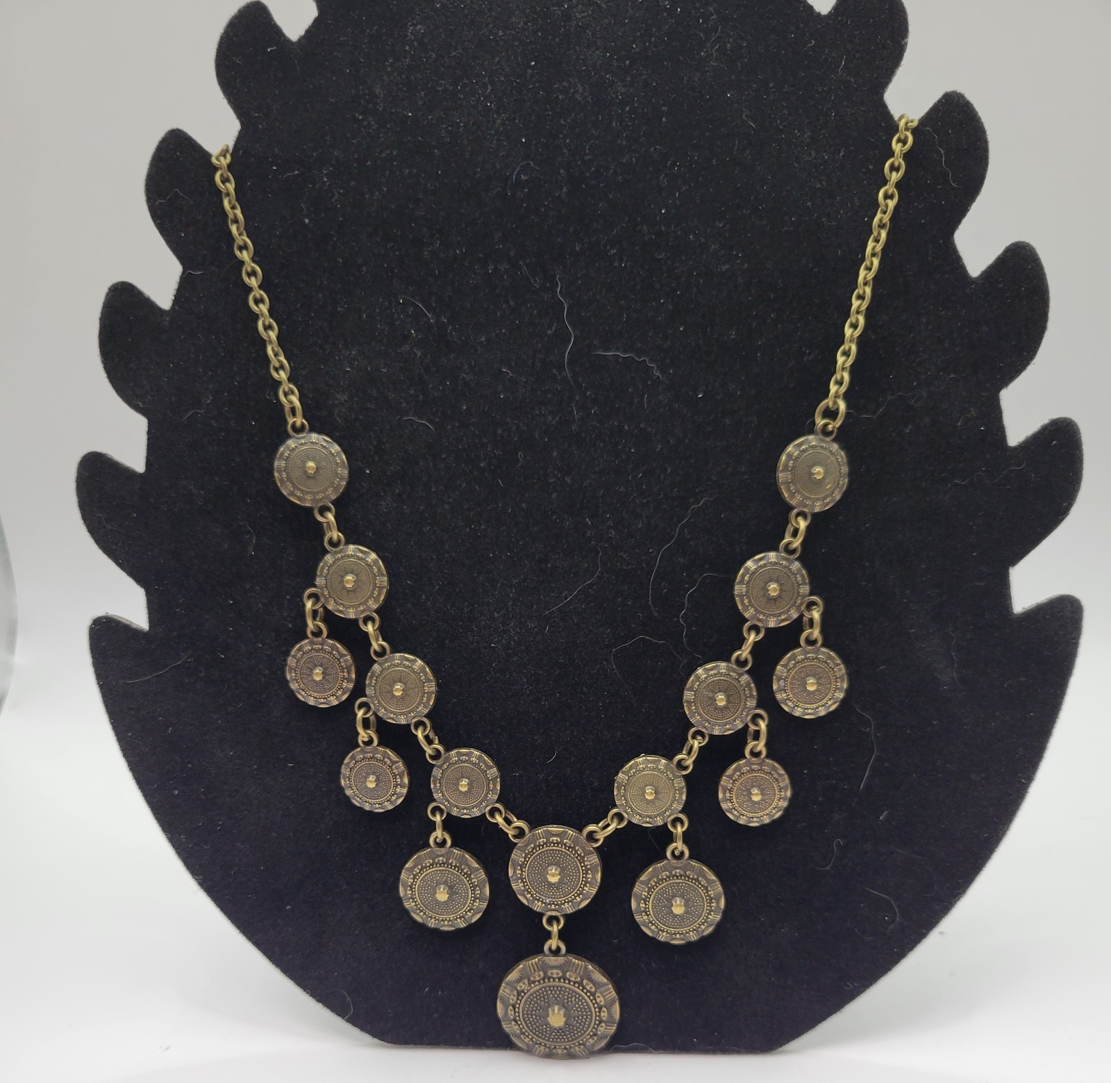 Bohemian Style Y-Drop Necklace with multiple textured coin shaped medallions