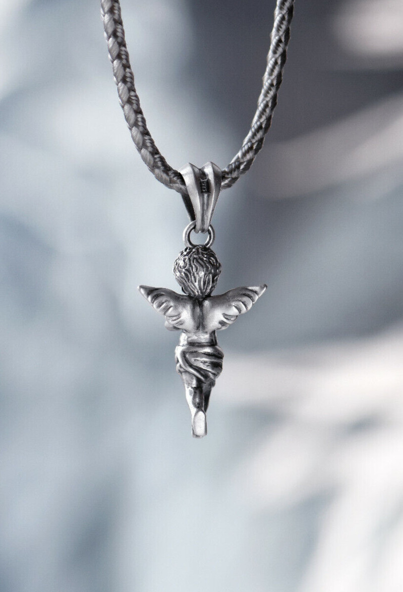 Angel. Pendant. Sterling silver,oxidised.