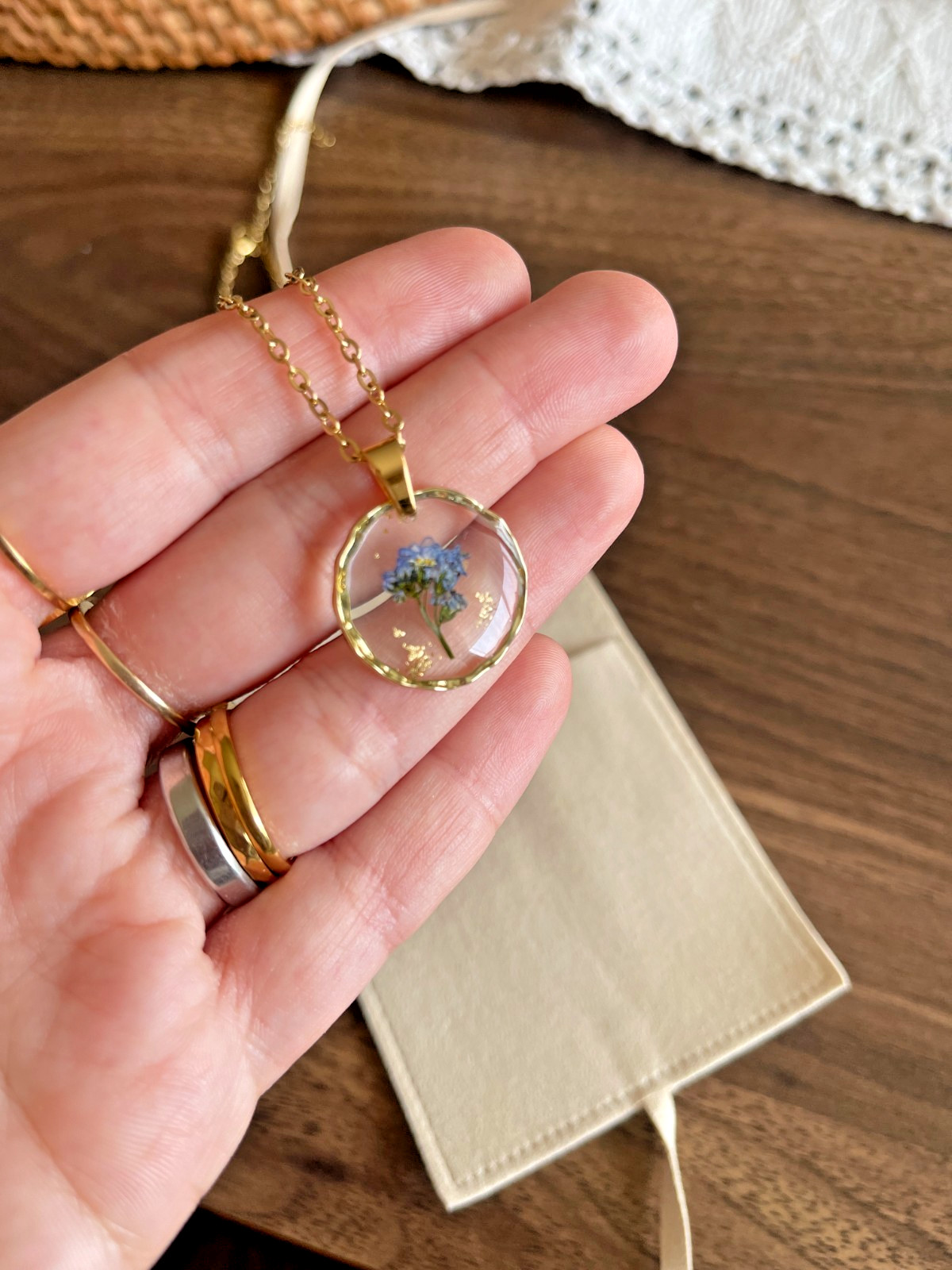 Golden Necklace with Blue Floral Resin Pendant