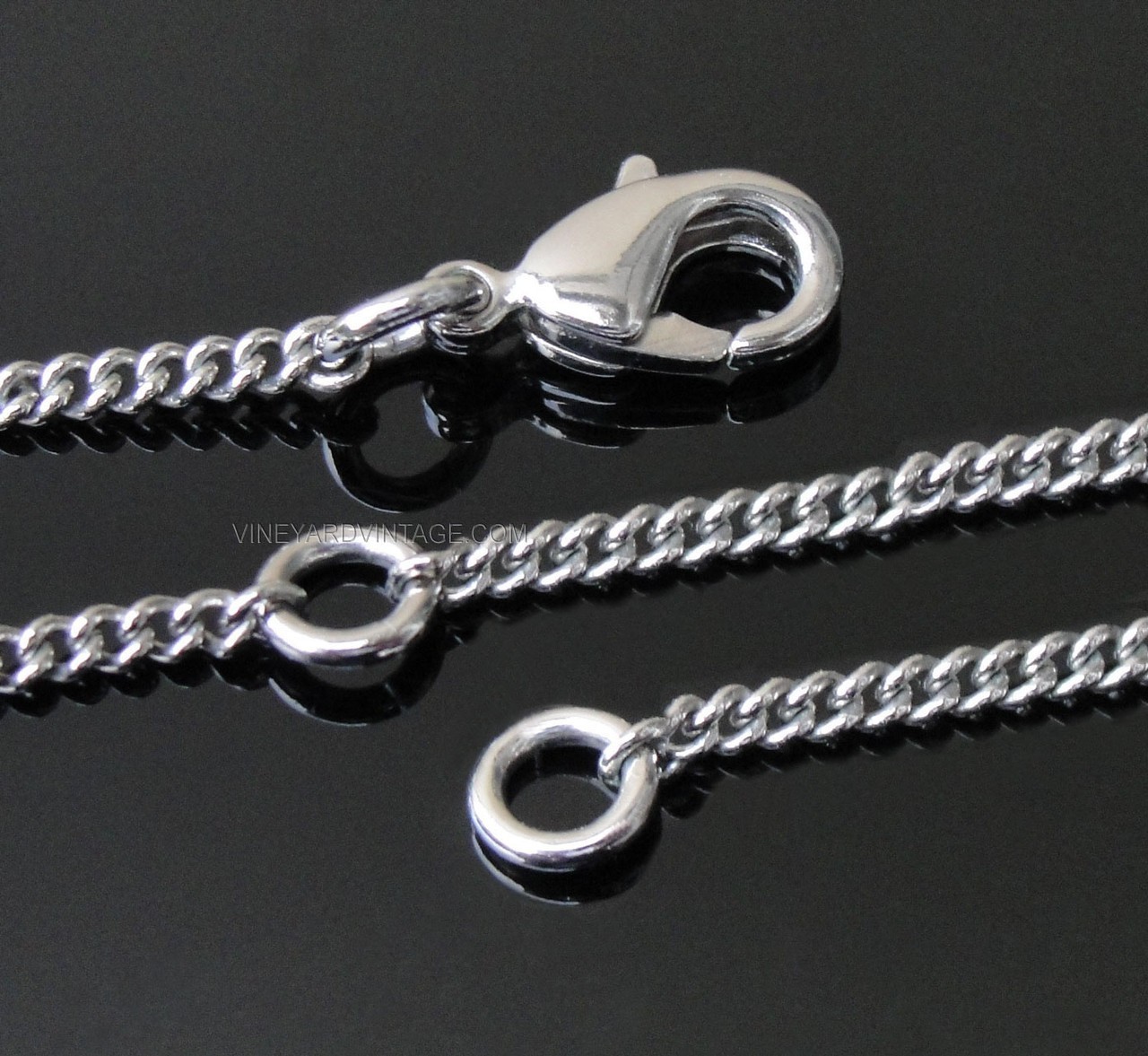 CHANEL AUTHENTIC OPEN WORK BOW & CRYSTAL CC LOGO NECKLACE