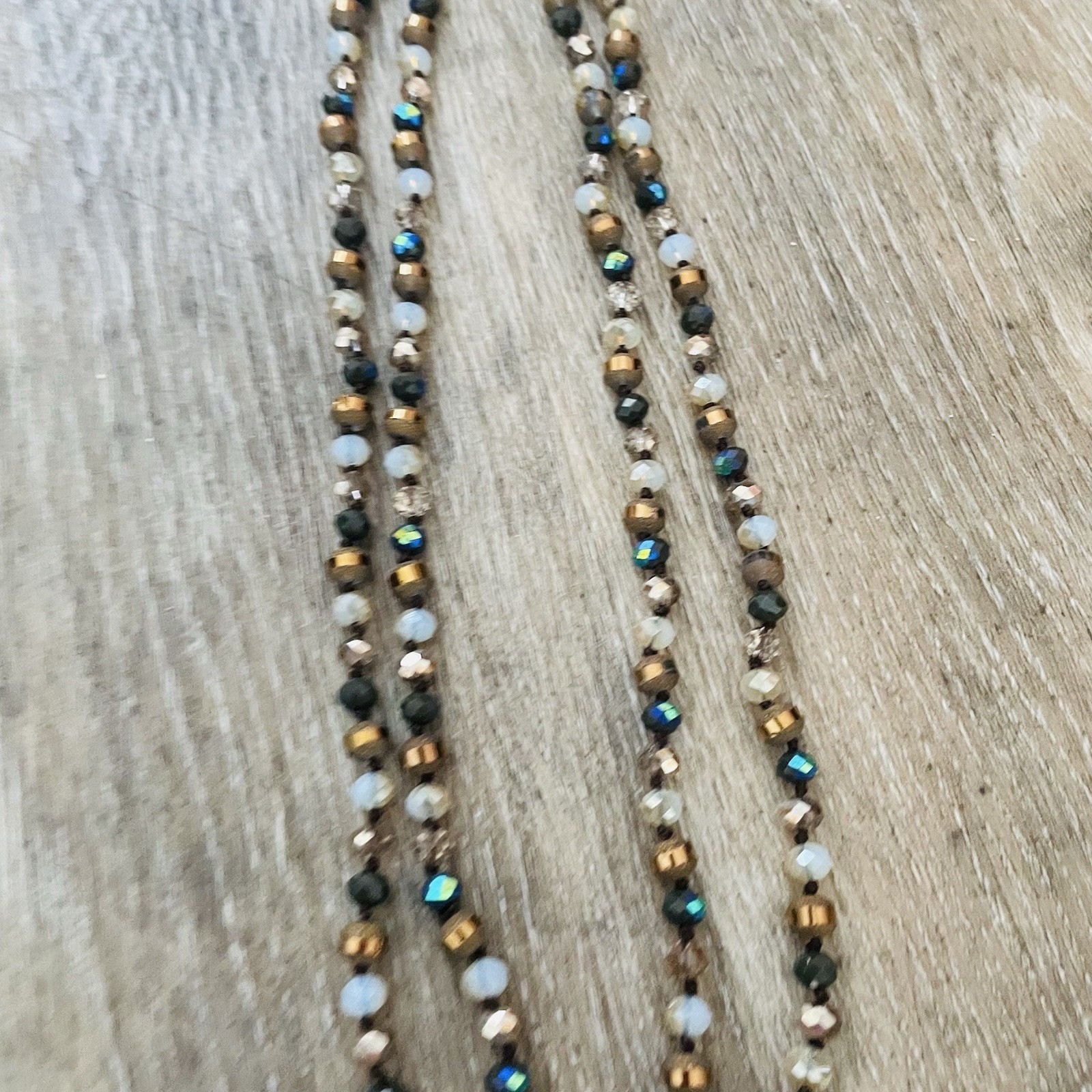 Multi-Strand Beaded Necklace in Gold, White & Black